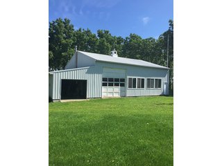 3.318+/- Acres between Columbia City and Fort Wayne on Lincolnway.  Mobile home, well, septic, and 2 acres of planted walnut trees.  Nice pole building with lean-to.  Easy to heat, storage or work shop, multi-use.  Great potential building site. - Residential/Industrial